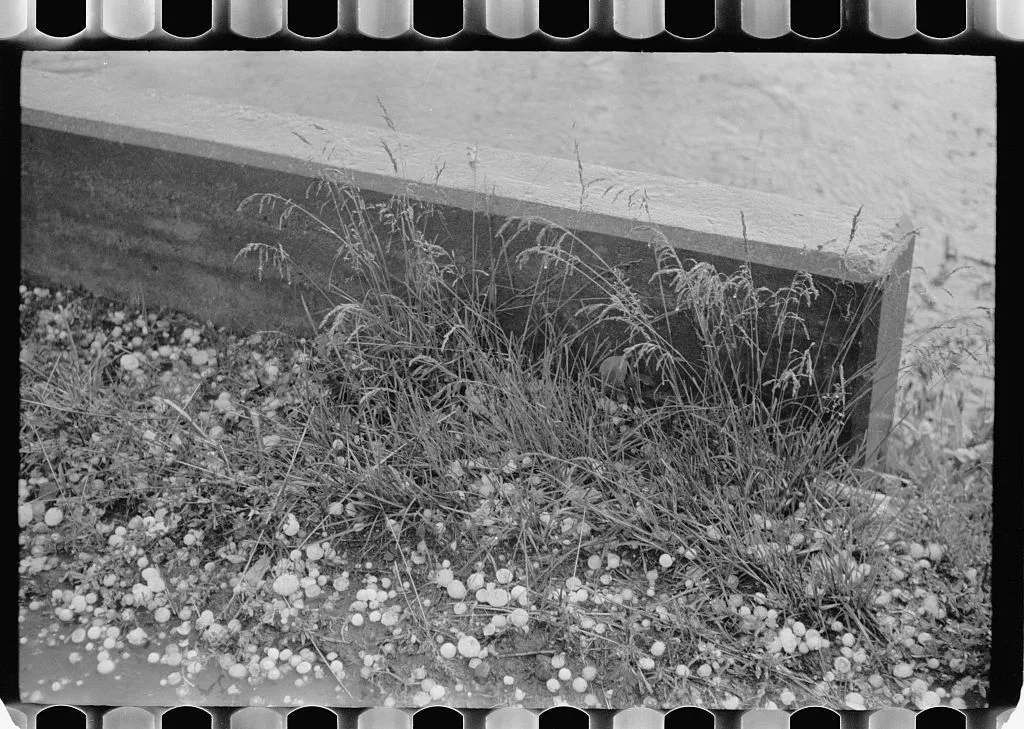 Hailstones along highway, Indiana, 1938