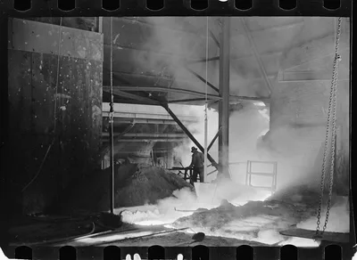 Tapping a blast furnace, Pittsburgh, Pennsylvania, 1938