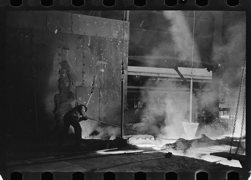 Tapping a blast furnace, Pittsburgh, Pennsylvania, 1938