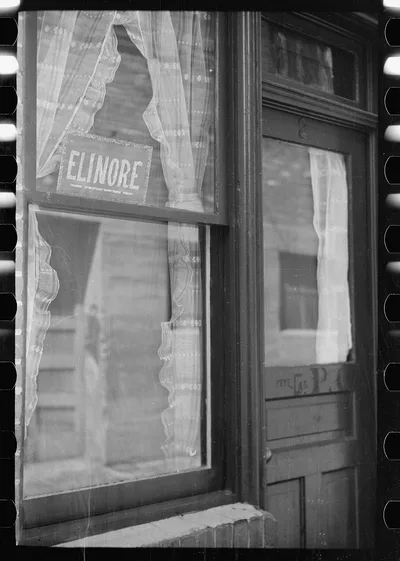 Sign in window, Venus Alley, Butte, Montana, 1939