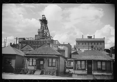 Houses with mine hoists in backyard, Butte, Montana, 1939