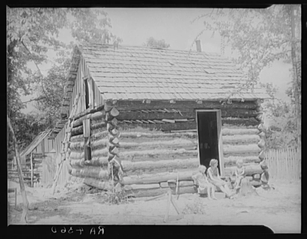 Log cabin constructed by rehabilitation client with the aid of a…, Arkansas, 1936