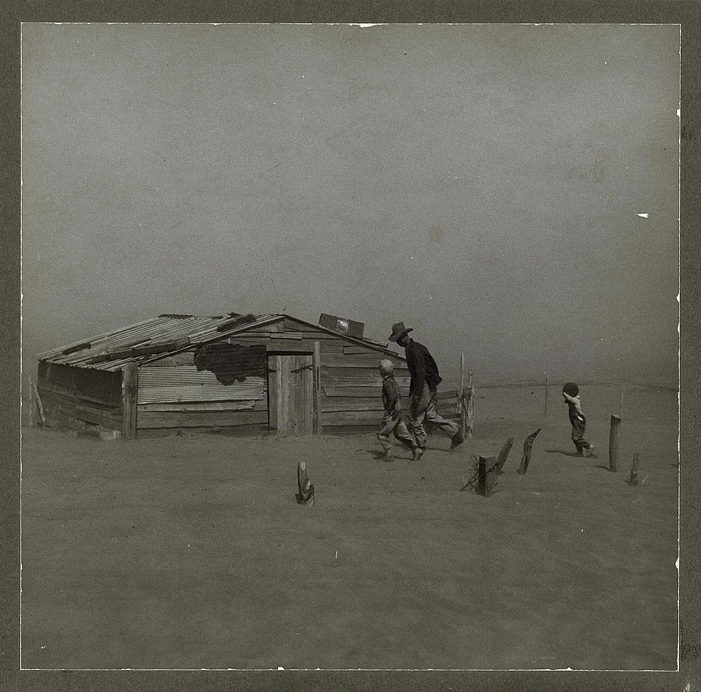 Farmer and sons walking in the face of a dust storm. Cimarron County,…, Oklahoma, 1936