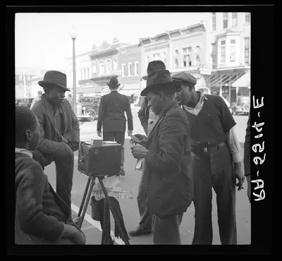 Street photographer. Smithfield, North Carolina, 1936