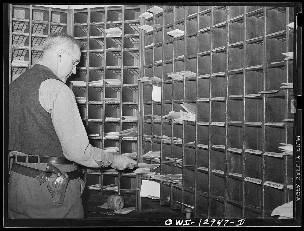 Sorting mail on board a mail car, 1938