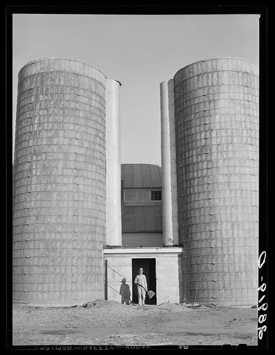 Silos at the Bois d'Arc cooperative farm store feed for 102 dairy…, Missouri, 1939