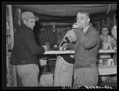 Farmer at lunch stand. Cornhusking contest. Marshall County, Iowa, 1939