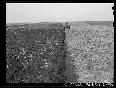 Fred Wilfang, rehabilitation client, uses modern tractor bought with…, Iowa, 1939