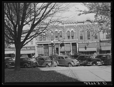 Stores opposite courthouse. Grundy Center, Iowa, 1939