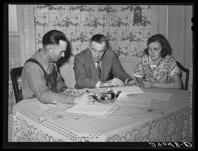 Fred Wilfang and his wife discuss their farm problems with the FSA…, Iowa, 1939