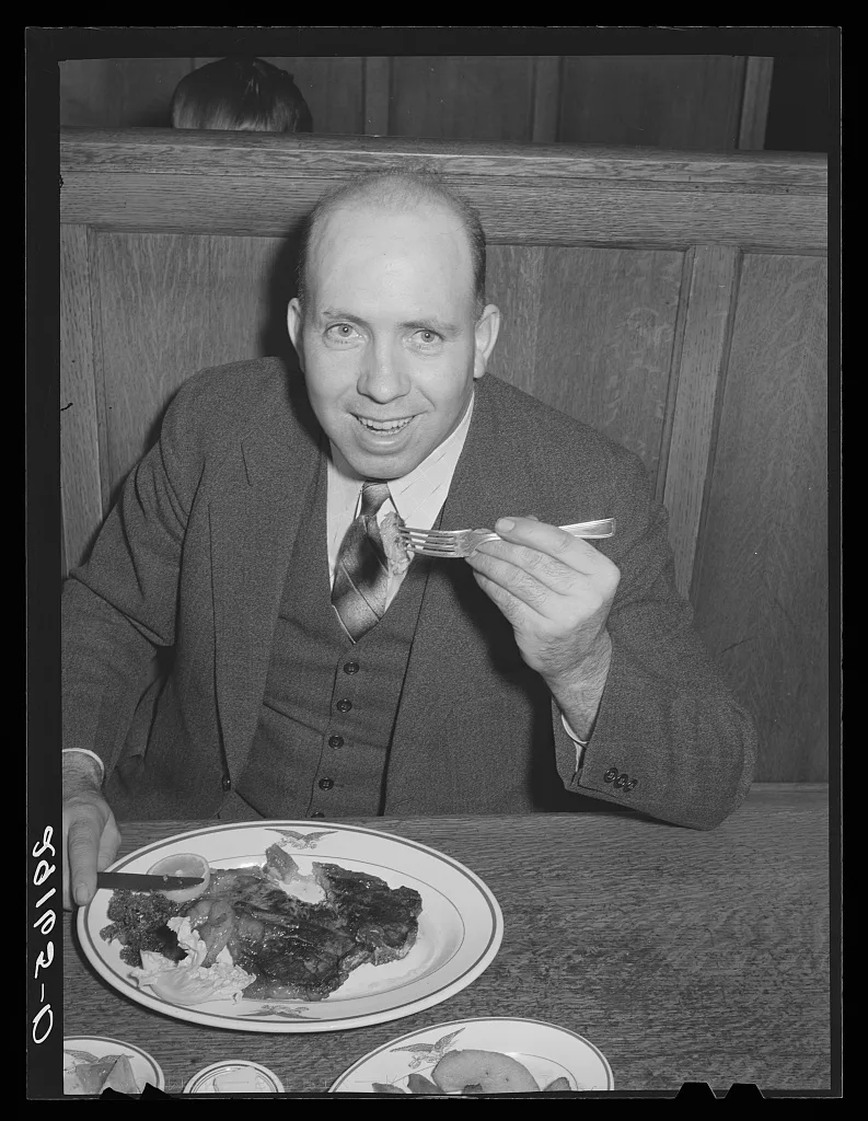 Diner with steak. Scotts Bluff, Nebraska, 1939