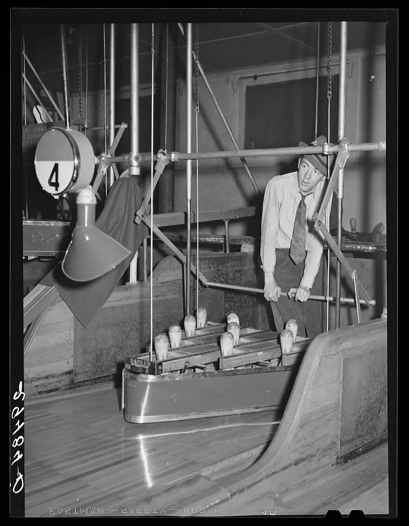 Pin boy in bowling alley. Clinton, Indiana, 1940