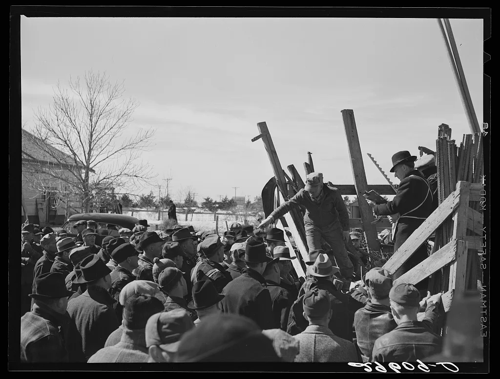 Auctioning farm equipment at Zimmerman farm near Hastings, Nebraska, 1940