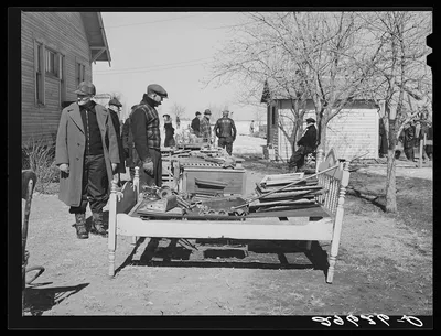 Neighbors examine furniture to be auctioned at P.C. Zimmerman's farm…, Nebraska, 1940