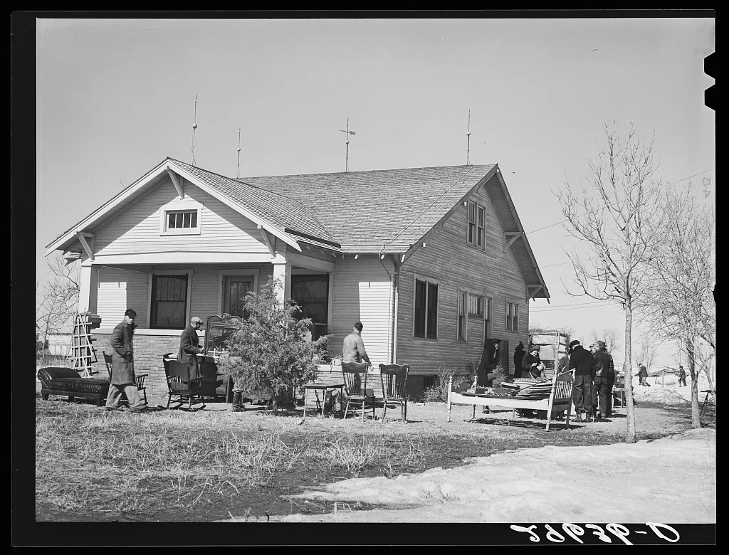 Furniture to be auctioned is displayed around P.C. Zimmerman's house…, Nebraska, 1940