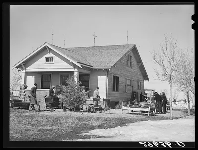 Furniture to be auctioned is displayed around P.C. Zimmerman's house…, Nebraska, 1940